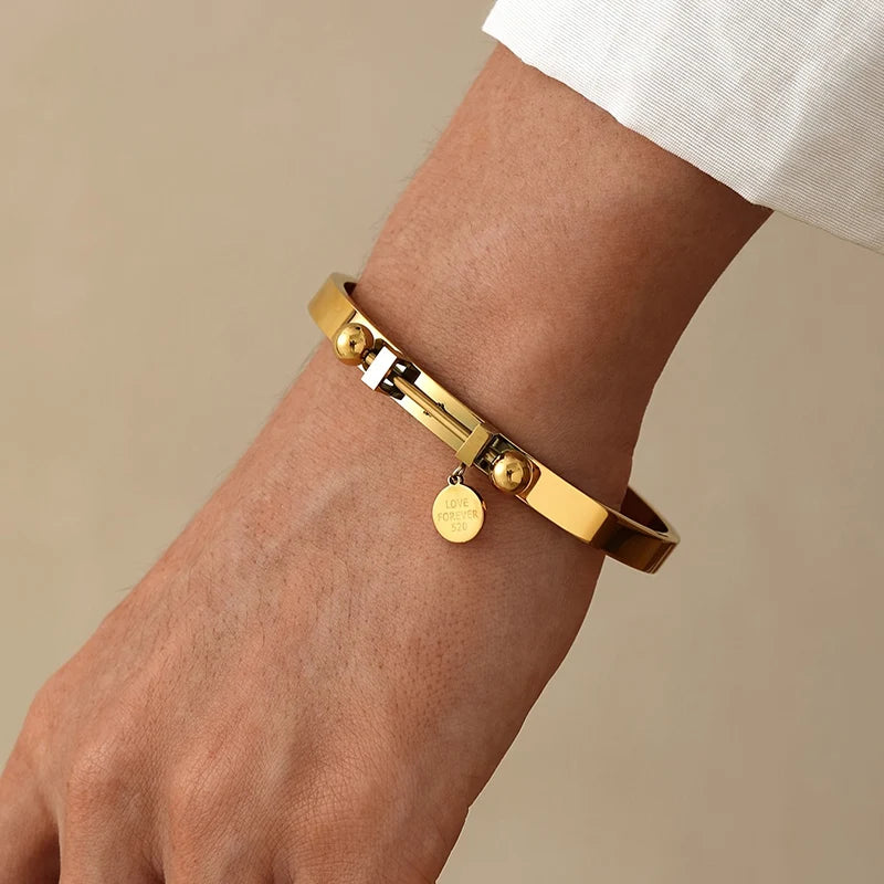 Elegant Stainless Steel 'Love' Engraved Geometric Bangle Chic Sexy Accessory for Women Men Weddings Party Casual Attire Jewelry